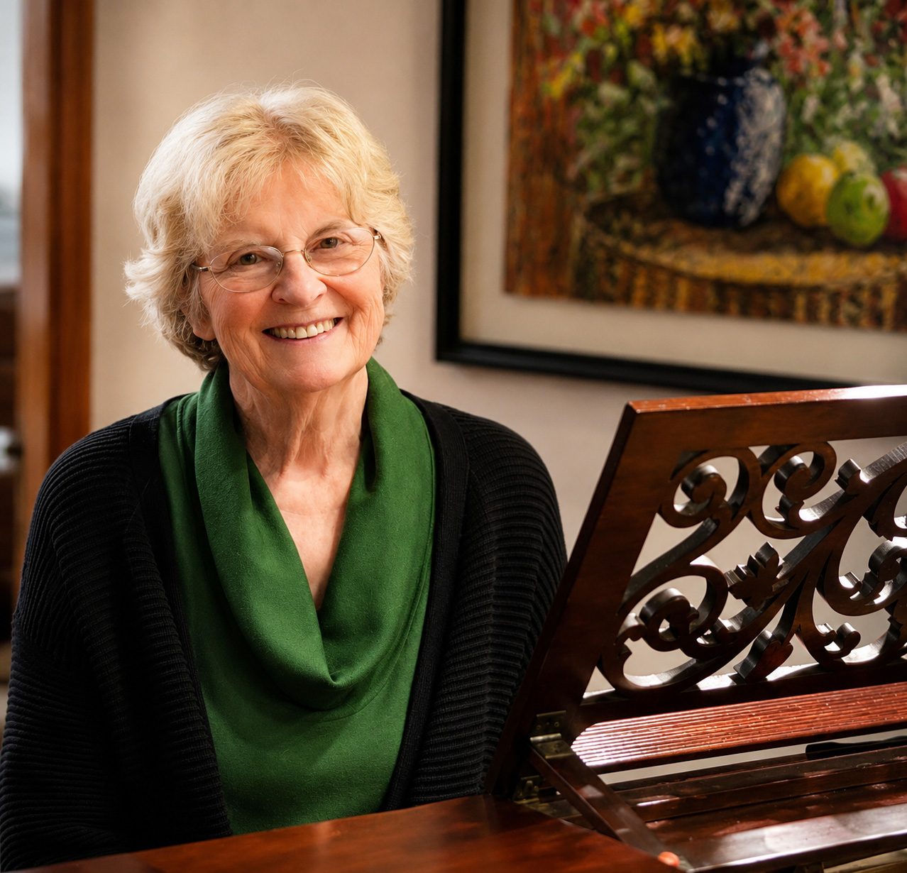 Susan Griesdale seated at her piano